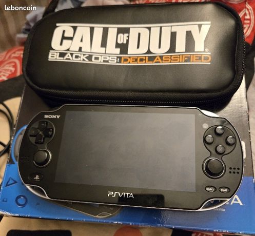 PS Vita OLED (3.65) COD + housse + jeux