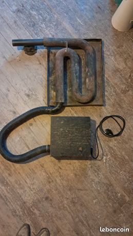 Récupérateur d air chaud pour foyer ouvert