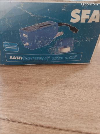 Sanicondens clim mini SFA Carton usé par le stockage mais produit en
