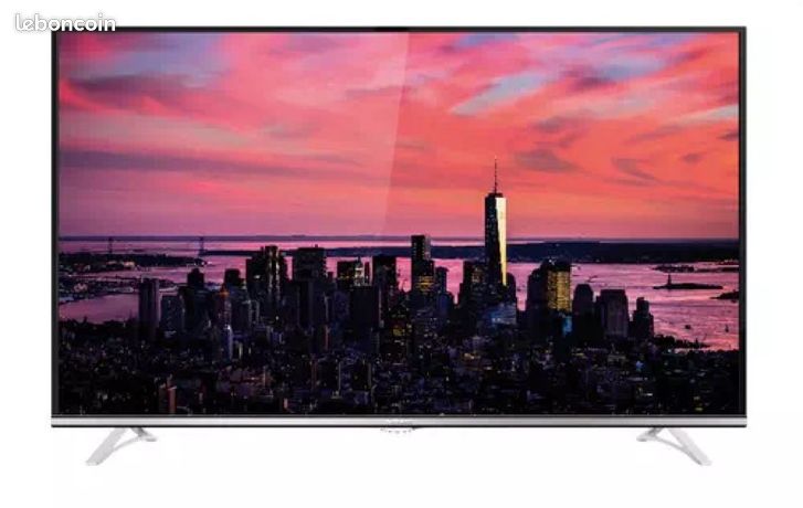 Smart TV THOMSON + Meuble Télé verre trempé