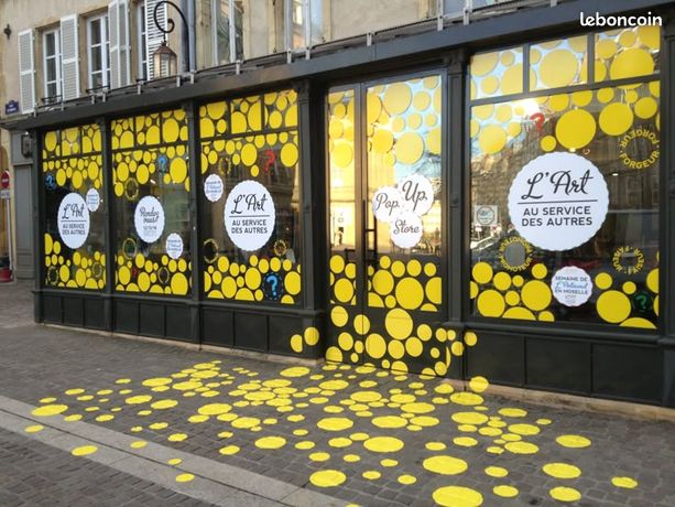 Stickers Dépolis & Intimité Vitrine IDF | Pose