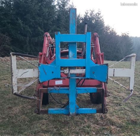 Sur-élévateur / pince hydraulique Calvet pour bottes de foin