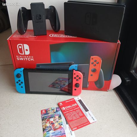 Switch avec accessoires et jeux Mariokart