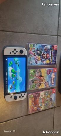 Switch oled + 3 jeux