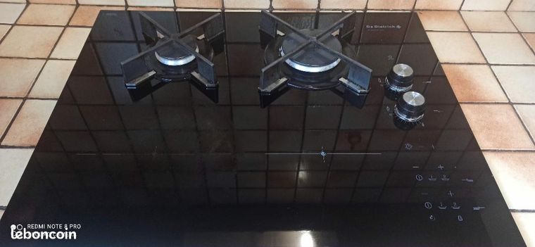 Table de cuisson noire de marque De Dietrich mixte 2 gaz et 2 induction avec mode d'emploi