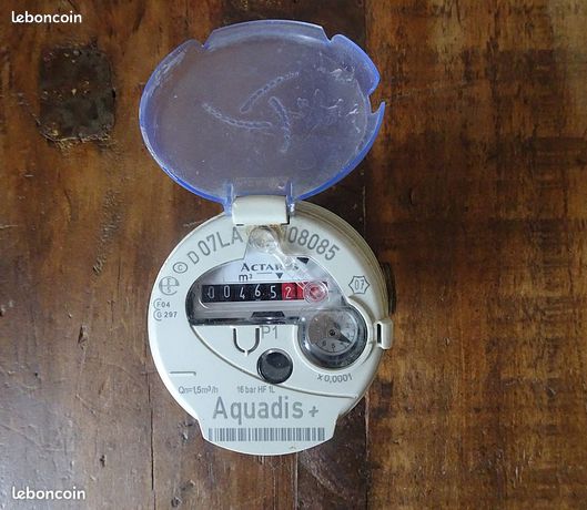 Trois compteurs d'eau dont un divisionnaire