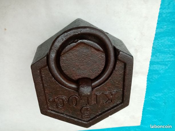 Un POIDS DE 5KILO POIDS en fonte petit prix