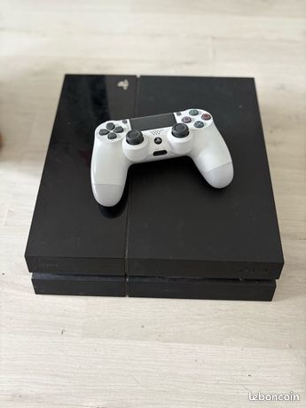 ps4 avec manette + 14 jeux