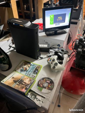 x box 360 avec 3 jeux