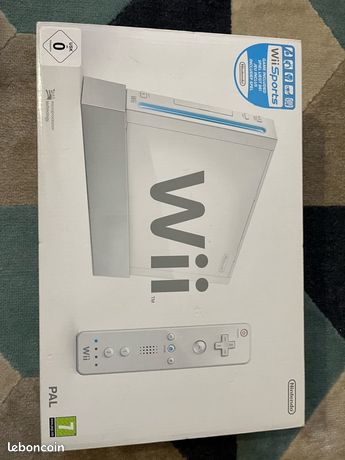 Wii complète + 5 manettes et 5 jeux